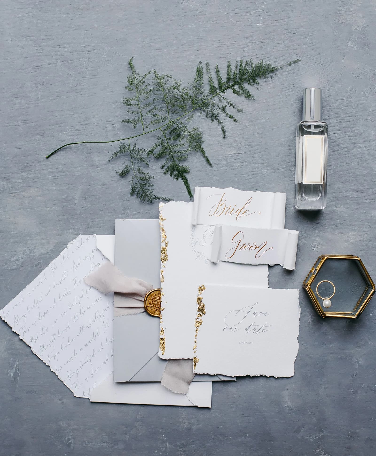 Wedding stationery arranged with handwritten details